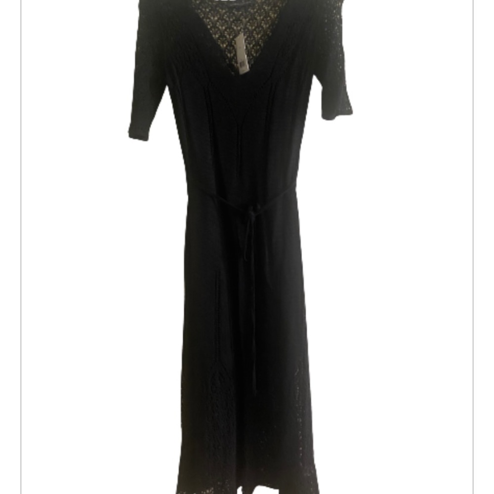 Banana republic black knit dress. Never worn. Tags attached. XS.